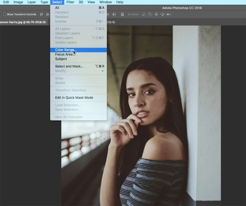 A photo of a woman looking at the camera in adobe photoshop