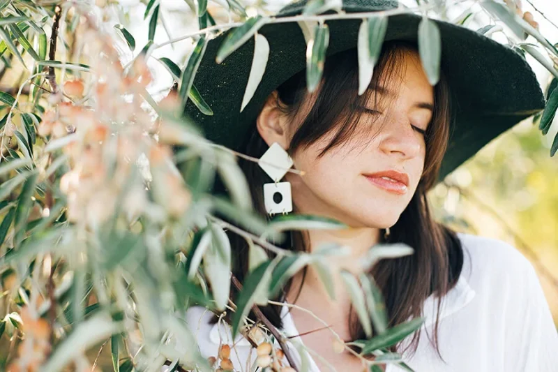The setting can impact how professional your portrait photography looks. Why not try getting out into nature to mix things up a bit? Image credit: Adobe Stock