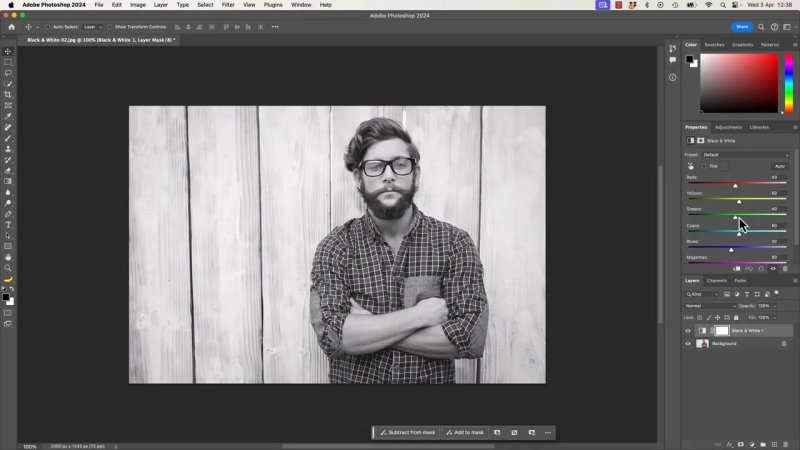 Adobe Photoshop 2024 workspace demonstrating a Black and White adjustment layer used to tweak color channel sliders for a high-contrast grayscale portrait.