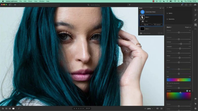 Adobe Lightroom workspace showing the model's hair tinted to a dark teal shade, with the right-hand adjustment panel displaying active Hue and Colorize settings for Mask 2
