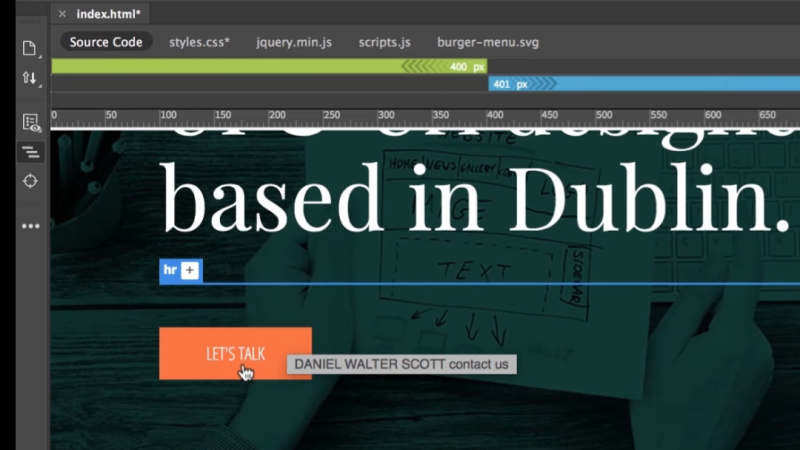 Dreamweaver workspace showing a blue line selector over an <hr> element positioned between the headline 