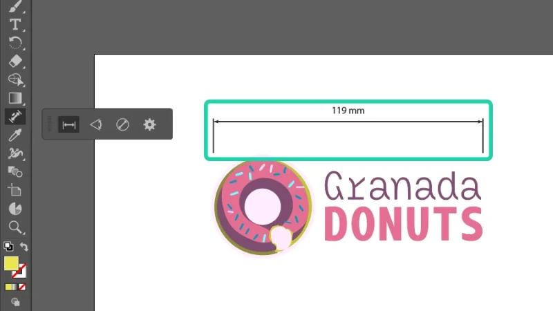 119 millimeters linear dimension guide placed above a vector logo in adobe illustrator