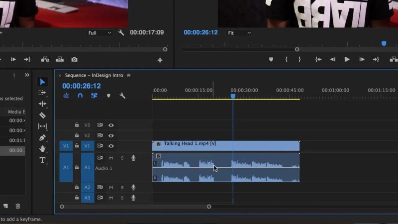 Premiere Pro timeline showing the playhead positioned over the audio waveform of 