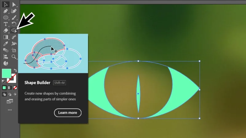 selecting the shape builder tool from the left toolbar in illustrator