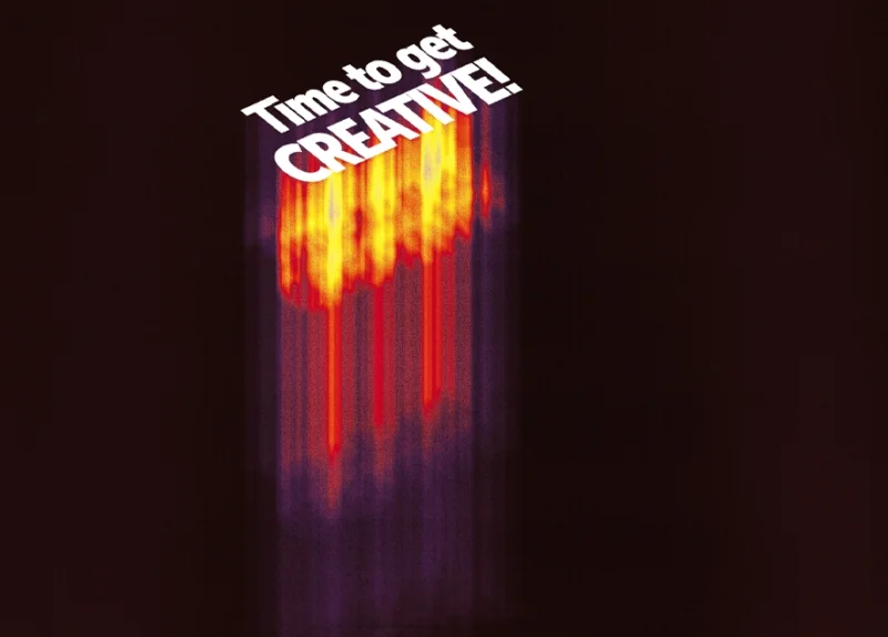 image of the phrase time to get creative over  fire trail in front of dark background