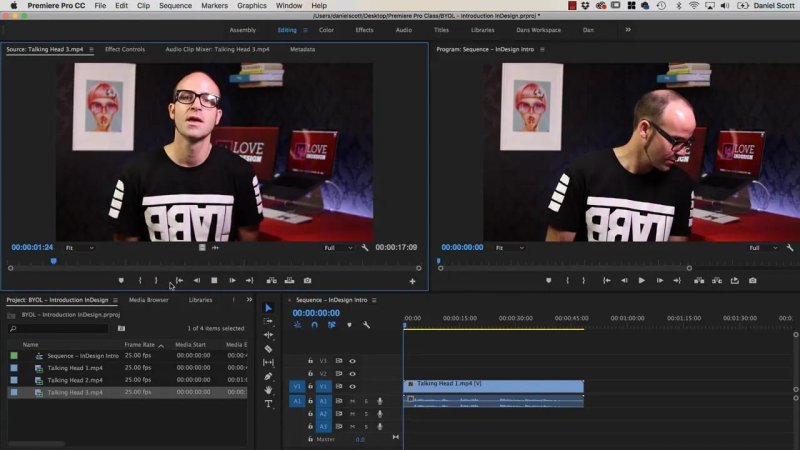 Premiere Pro CC workspace with dual monitors displaying an instructor at an editing desk, with the first video clip placed on timeline track V1.