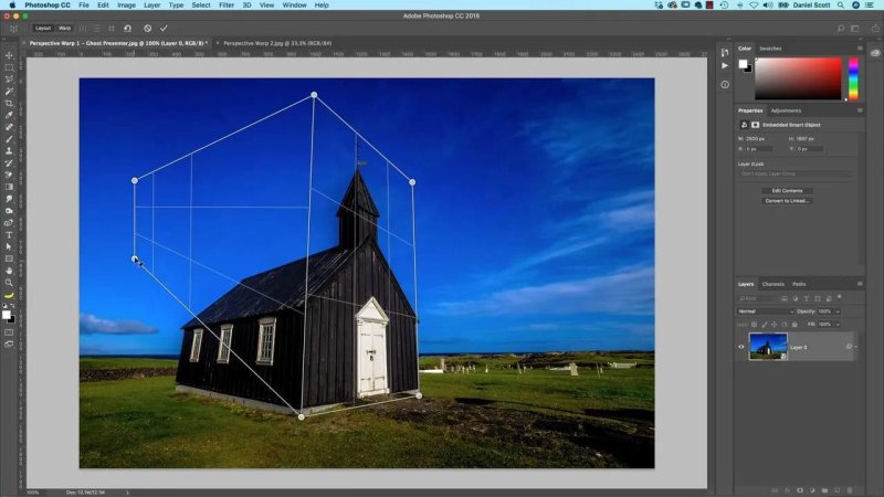 Photoshop canvas showing a photograph of a black wooden church under a bright blue sky, with white Perspective Warp layout grid lines and corner pins aligned to the structure's angled walls.