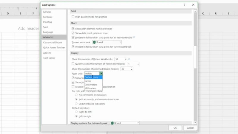 Excel Options dialog box open on the Advanced tab under the Display settings section, with the Ruler units dropdown menu expanded to show Default Units, Inches, Centimeters, and Millimeters.