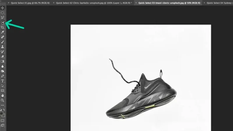 running shoe over white background and quick selection tool pointed out from the toolbar in photoshop