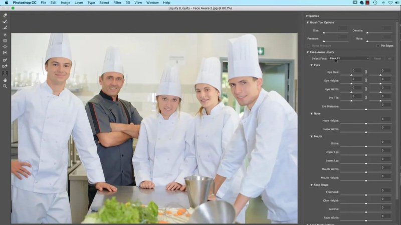 Adobe Photoshop Liquify window demonstrating multi-face detection on a group of culinary students, using the 