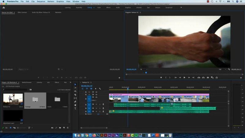 Premiere Pro timeline displaying an active editing sequence with an Adjustment Layer on V2 and multiple video cuts on track V1.